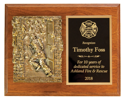Antique finish casting mounted on a plaque with engraved plate and 10 perpetual plates.