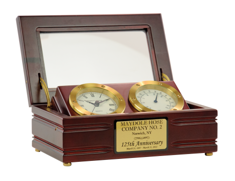 Clock and thermometer are set in beautiful satin finish mahogany wood case with glass lid featuring brass hinges and fittings.