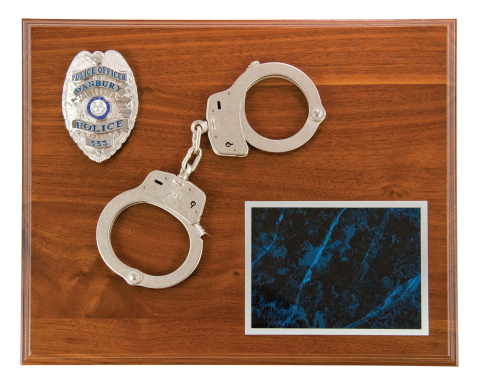 Solid walnut plaque includes handcuffs and premium aluminum engraved plate with silver letters to accent silver cuffs. Room to mount recipient’s badge.