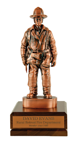 Copper finished firefighter on a solid walnut base with copper finished brass engraving plate.