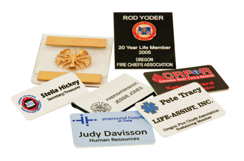 Name badges of various styles.