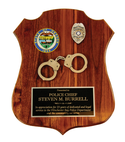 2”x15” solid walnut plaque with engraved plate and handcuffs is customized with your department’s logo and individual officer badge