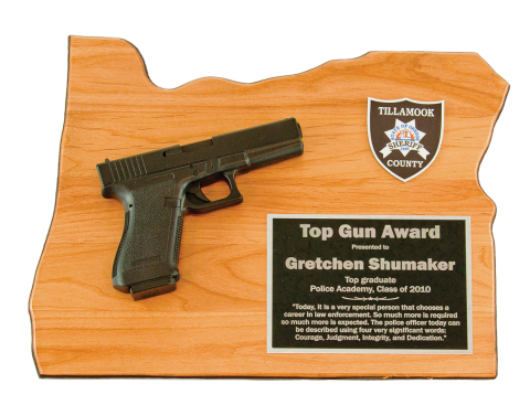 Solid red alder plaque in the shape of your state, matte black gun replica mounted,