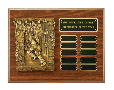 Antique finish casting mounted on plaque with engraved plate and 10 perpetual plates.