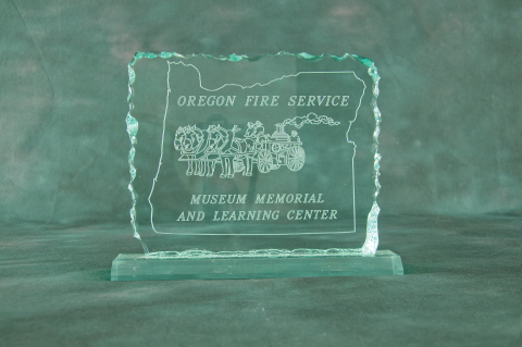 Clear acrylic plaque (8×10) with cracked ice edge and acrylic base. Reverse engraved on the back with your message and department logo.